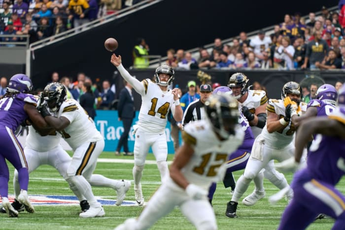 New Orleans Saints quarterback Andy Dalton (14) throws the ball against the Minnesota Vikings. Mandatory Credit: Peter van den Berg-USA TODAY Sports